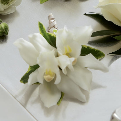 White Mini Cymbidium Boutonniere –  Valley Flower Shoppe, Waverly NY
